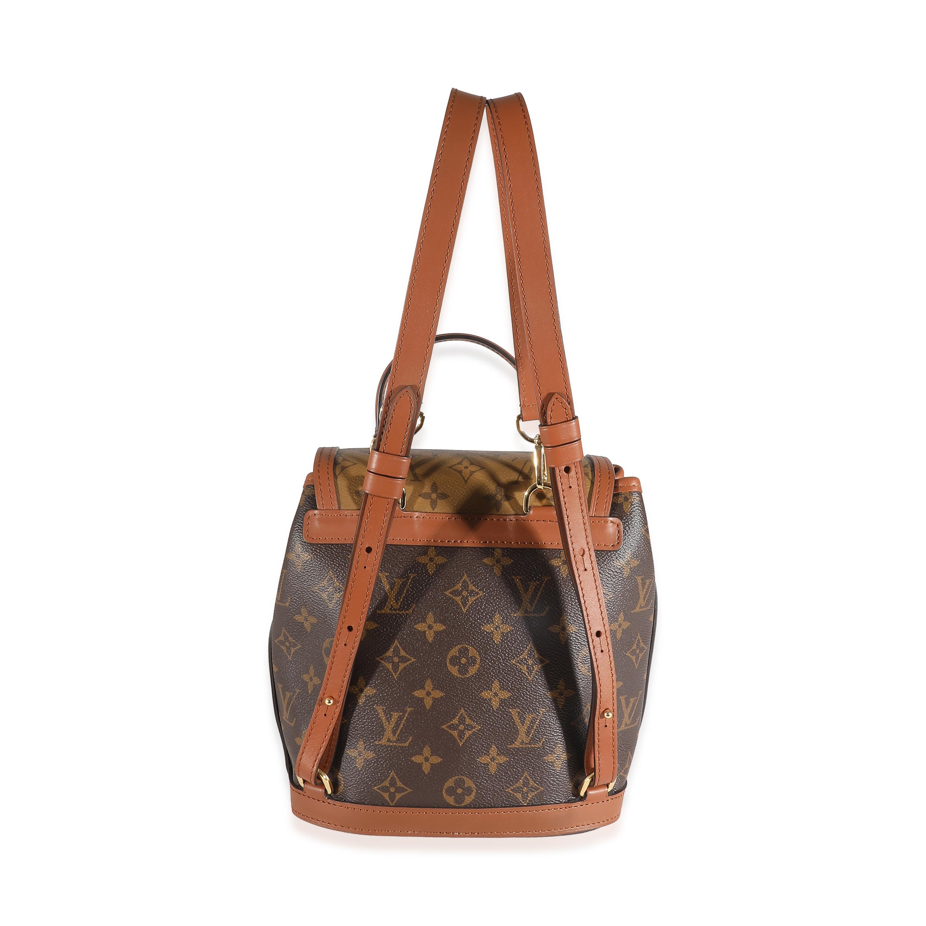 Listing Title: Louis Vuitton Monogram Reverse Canvas Dauphine Backpack
SKU: 136368
Condition: Pre-owned 
Handbag Condition: Excellent
Condition Comments: Item is in excellent condition and displays light signs of wear.  Light scratching along