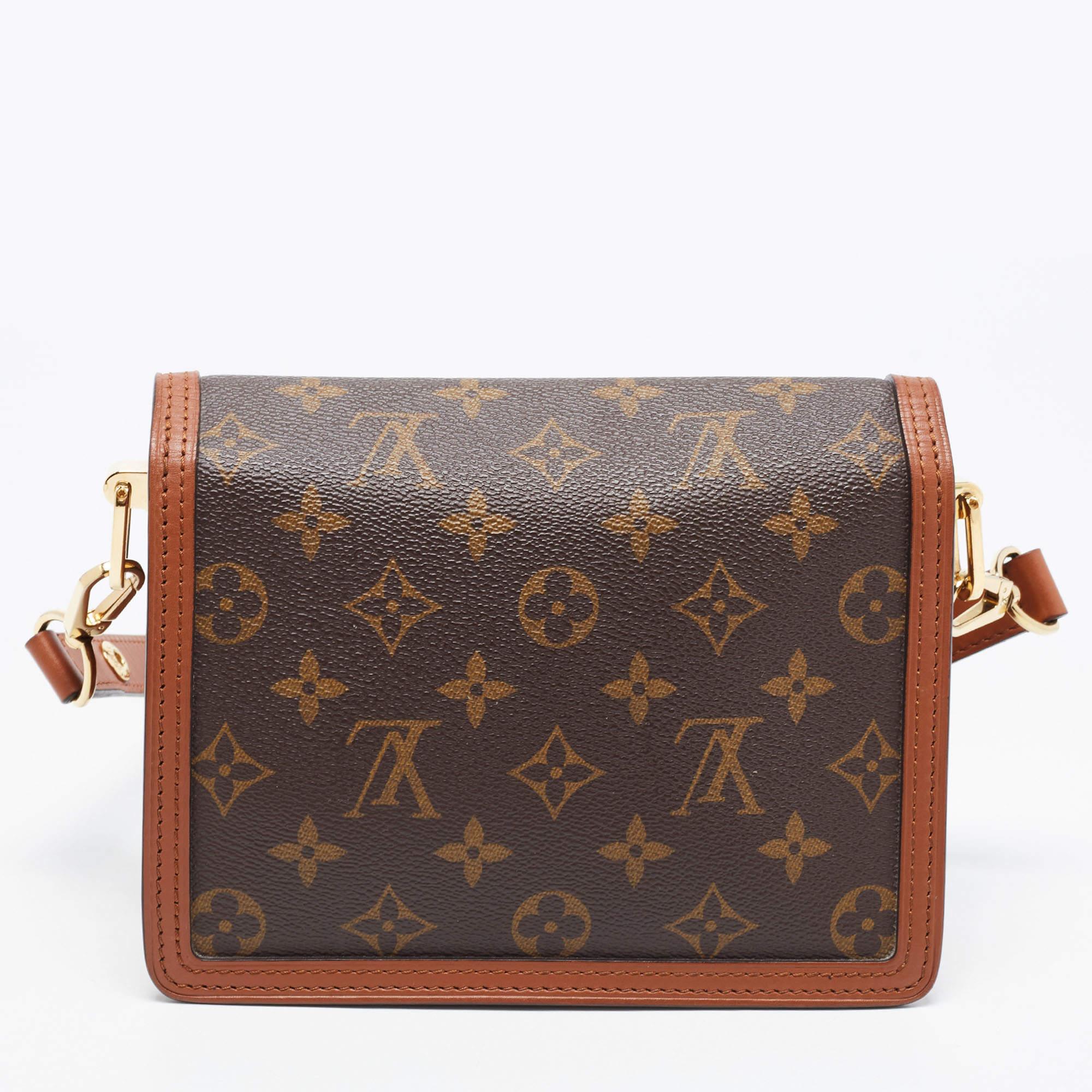 Monogram Dauphine Belt bag in Monogram & Reverse Monogram Coated Canvas  with a Calfskin trim and gold tone hardware and black microfibre lining.  Louis Vuitton. 2019., Handbags and Accessories Online