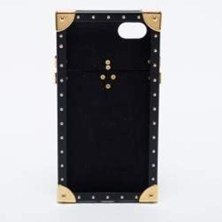 What's not to love about accessories that can both be flaunted and functional? To protect your iPhone 7, this stunning Louis Vuitton case has been crafted from Monogram Reverse canvas and styled to resemble their famous trunk designs. It has