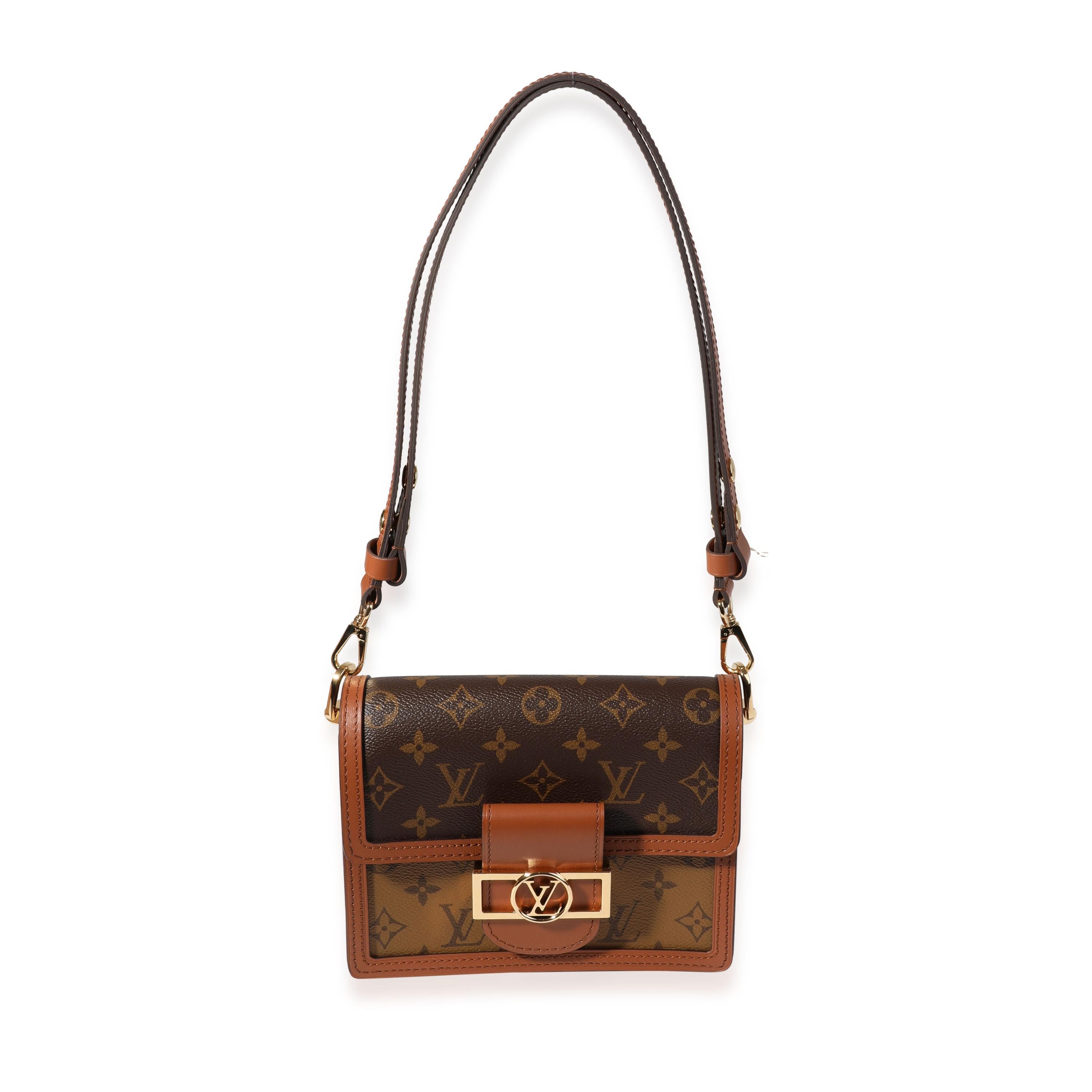 Listing Title: Louis Vuitton Monogram Reverse Canvas Mini Dauphine
SKU: 119988
MSRP: 3400.00
Condition: Pre-owned (3000)
Handbag Condition: Excellent
Condition Comments: Excellent Condition. Plastic on some hardware. Light discoloration to interior