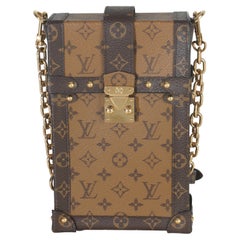 Louis Vuitton Monogram Reverse Canvas Vertical Trunk Pochette