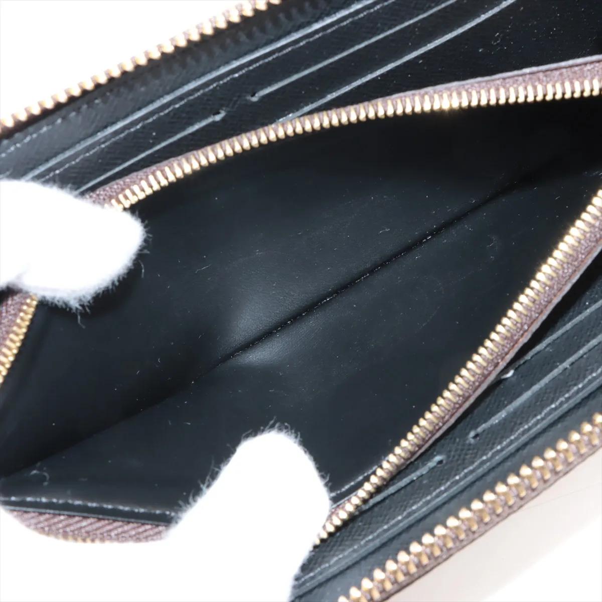 Louis Vuitton Monogram Reverse Clemence Geldbörse im Angebot 5