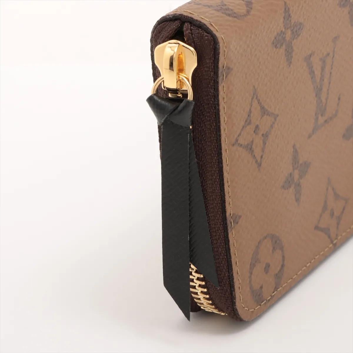 Louis Vuitton Monogram Reverse Clemence Geldbörse im Angebot 9