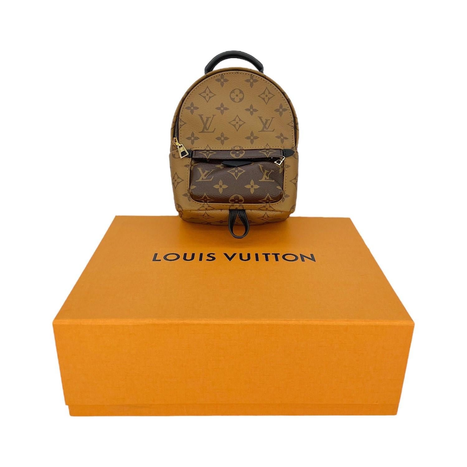 This Louis Vuitton Mini Palm Springs Backpack was made in France and it is finely crafted of the Louis Vuitton Monogram Reverse coated canvas with leather trimming and gold-tone hardware features. It has a small zipper pocket on the front. It has a