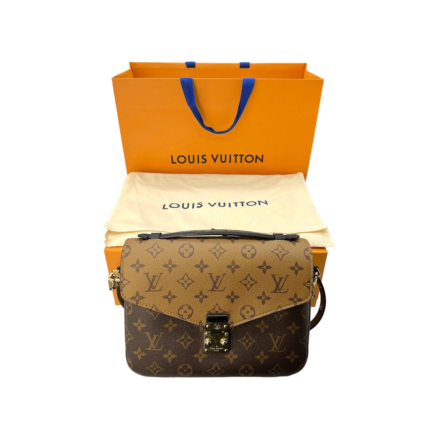 This Louis Vuitton Pochette Métis bag was made in France and it is crafted of the trendy Louis Vuitton Monogram Reverse coated canvas exterior with leather trimming and gold-tone hardware features. It has a zipper pocket on the backside and it also