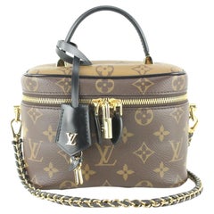 Sac  main  bandoulire Louis Vuitton modle Reverse Vanity PM avec monogramme 1LVJ1118