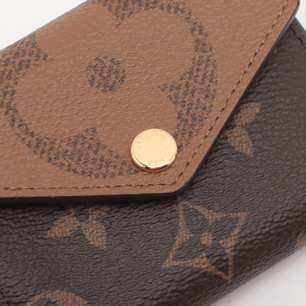*Portefeuille Victorine inversé Monogram de Louis Vuitton 6