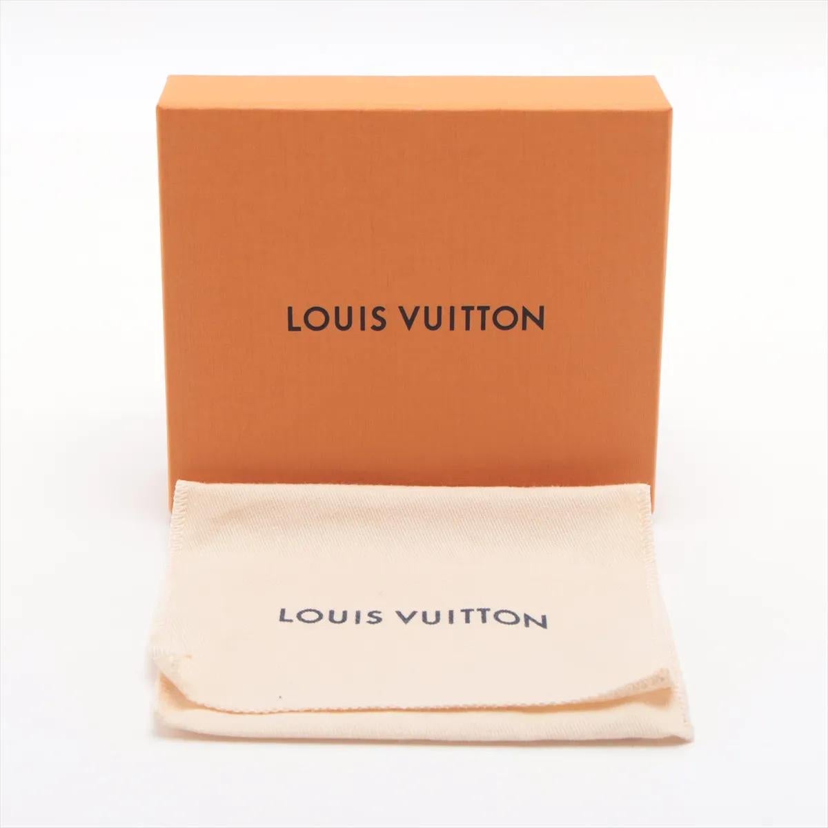 *Portefeuille Victorine inversé Monogram de Louis Vuitton 7