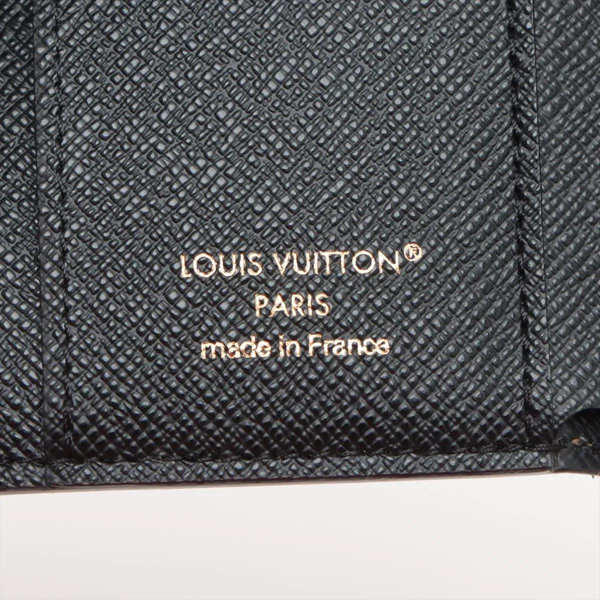 *Portefeuille Victorine inversé Monogram de Louis Vuitton 4