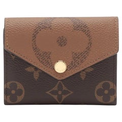 *Louis Vuitton Monogram Reverse Victorine Wallet