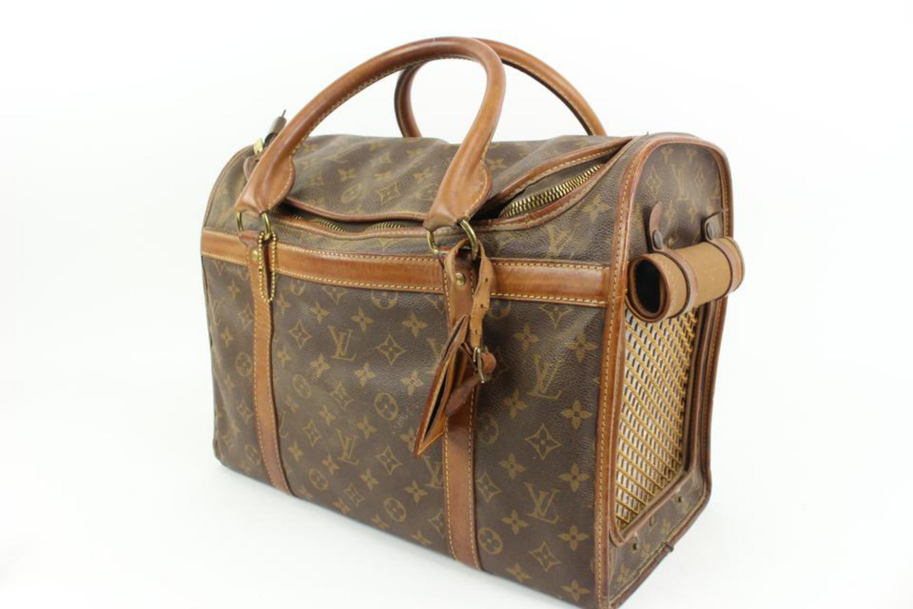 Louis Vuitton Monogram Sac Chien 40 Pet Carrier Dog Cage 19lk323s
Date Code/Serial Number: SL0938
Made In: France
Measurements: Length:  15.5