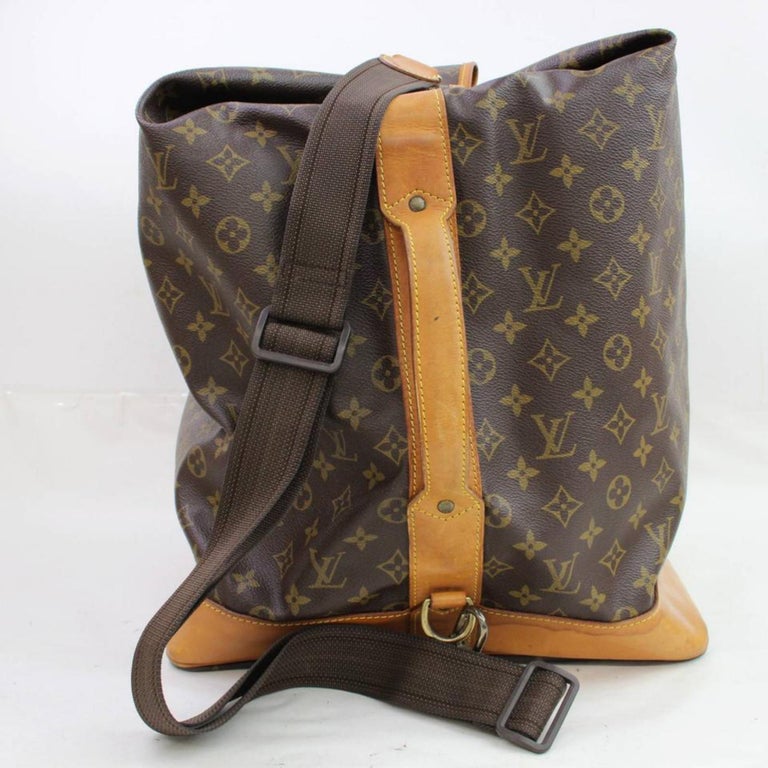 Louis Vuitton Monogram Sac Marin 866711 Brown Coated Canvas Wristlet For Sale at 1stdibs