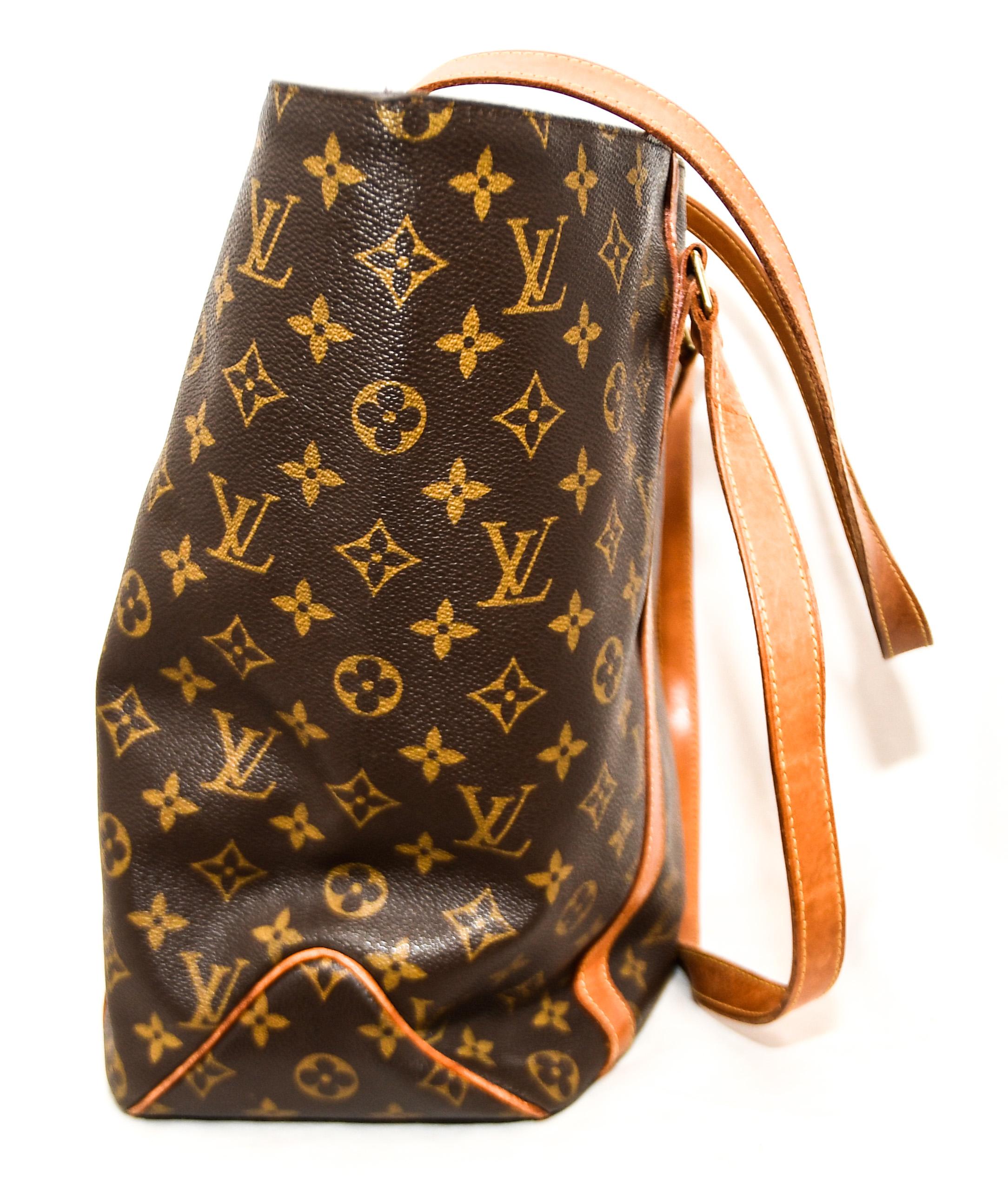 Louis Vuitton monogram Sac Shopping tote, is a large shopping tote designed to be carried with ease and simple to wear. It is crafted with the classic Louis Vuitton monogram coated canvas with complementary signature vachetta natural cowhide