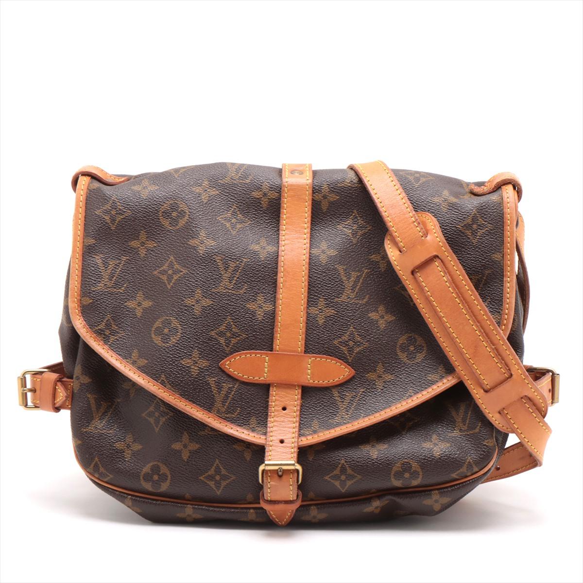 The Louis Vuitton Monogram Saumur 30 is a classic and versatile handbag that embodies the brand's iconic Monogram canvas design. The crossbody bag features the instantly recognizable LV monogram pattern in rich brown hues, exuding a sense of