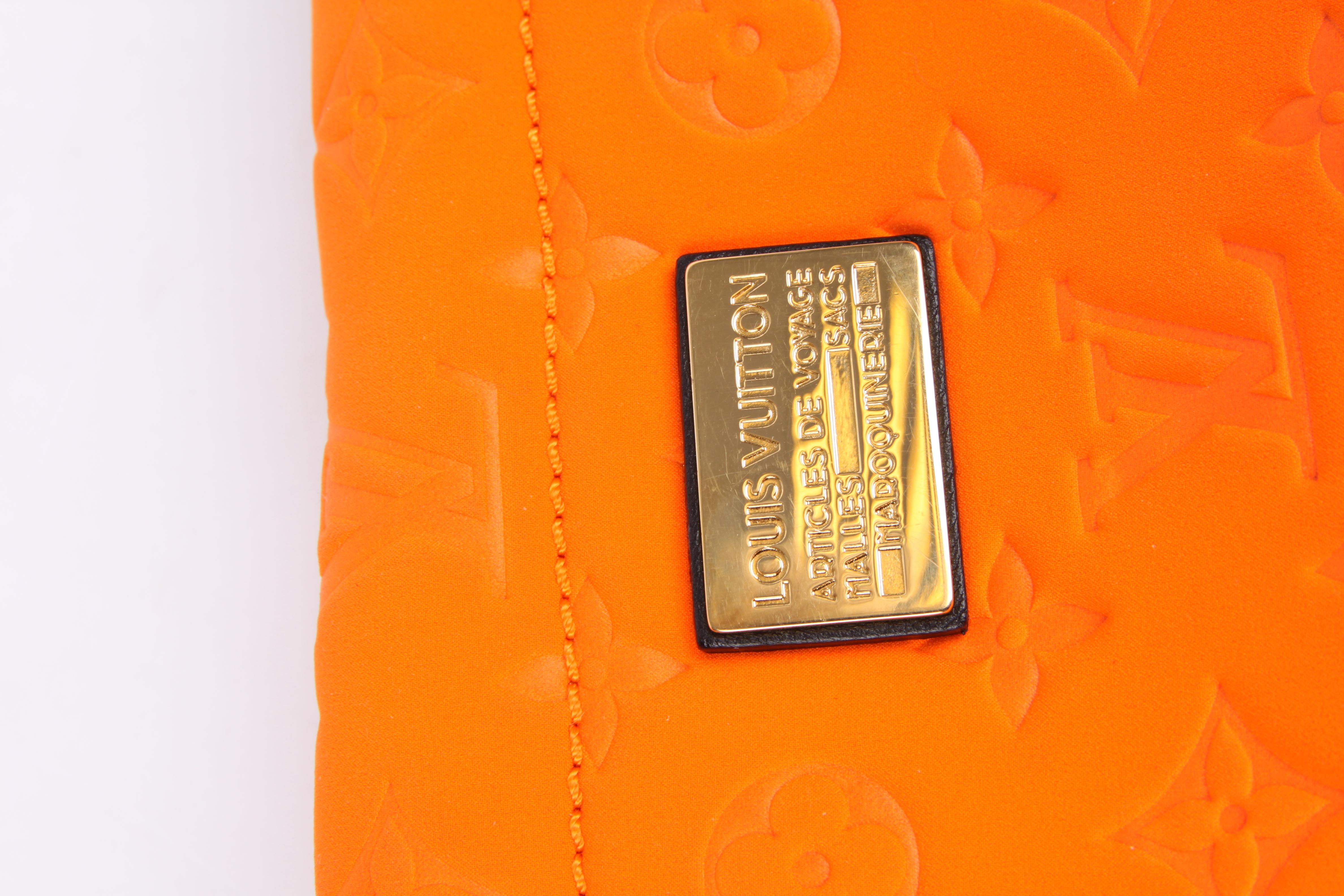 Louis Vuitton Monogram Scuba Clutch - orange In Good Condition In Baarn, NL