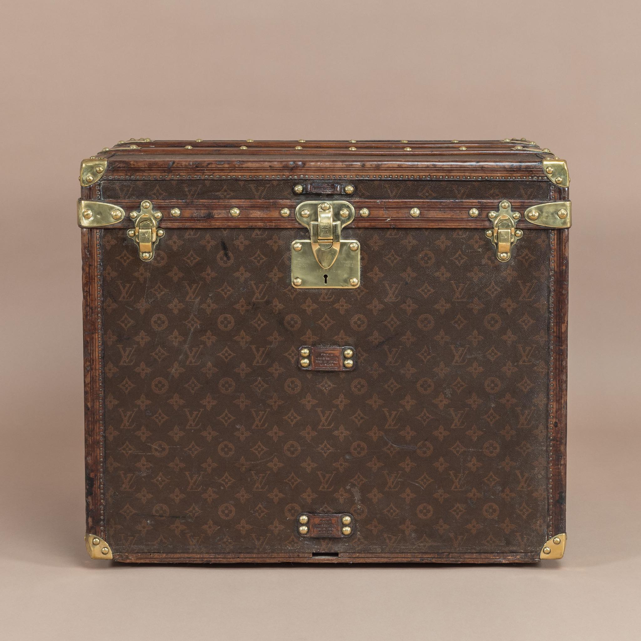 A stunning Louis Vuitton trunk circa 1905 with LV monogram pattern canvas, leather trim, polished brass handles & fittings, original lining and all the felt lined trays. Also includes an original key.

Louis Vuitton was founded by its namesake in