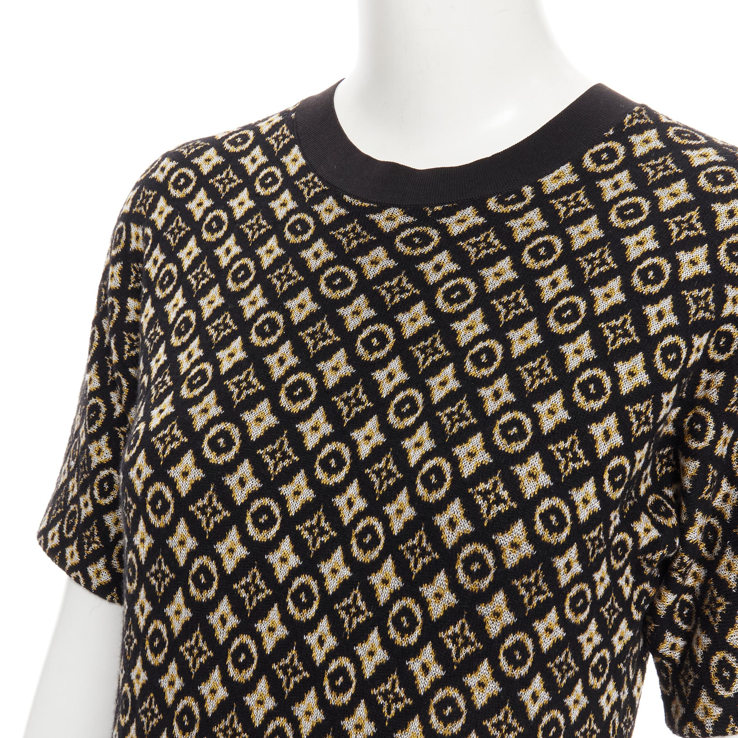 LOUIS VUITTON monogram silk cashmere knitted black stretch casual dress S 
Reference: TGAS/B01417 
Brand: Louis Vuitton 
Material: Silk 
Color: Brown 
Pattern: Floral 
Extra Detail: Silk cashmere knitted upper. Brown and yellowl LV flower logo.