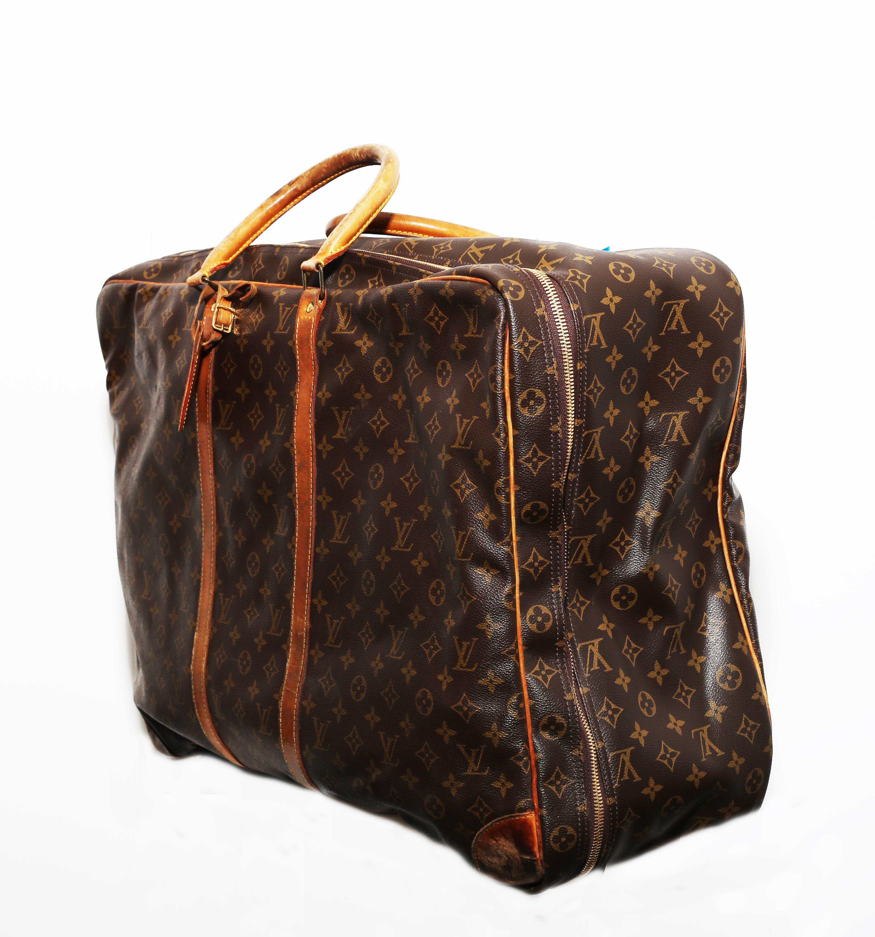 Louis Vuitton Monogram Sirius Suitcase 70cm Luggage Weekender Travel Bag 80s
 This beautiful luggage is in good condition. The luggage does have some wear to it but still looks good as new. There are two beige handles and two beige leather strips