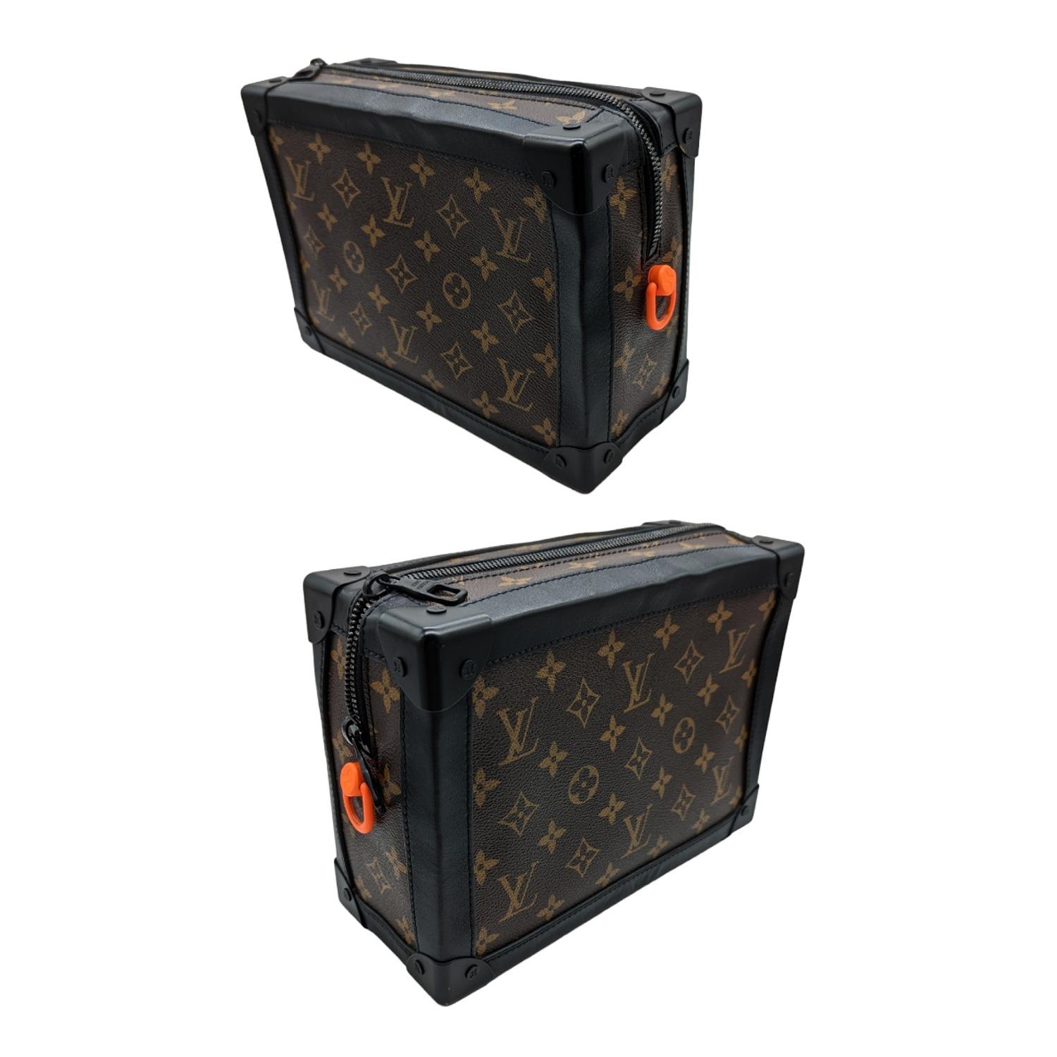 louis vuitton black trunk bag