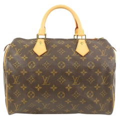 Louis Vuitton - Sac Speedy 30 Boston avec monogramme MM 31lv223s