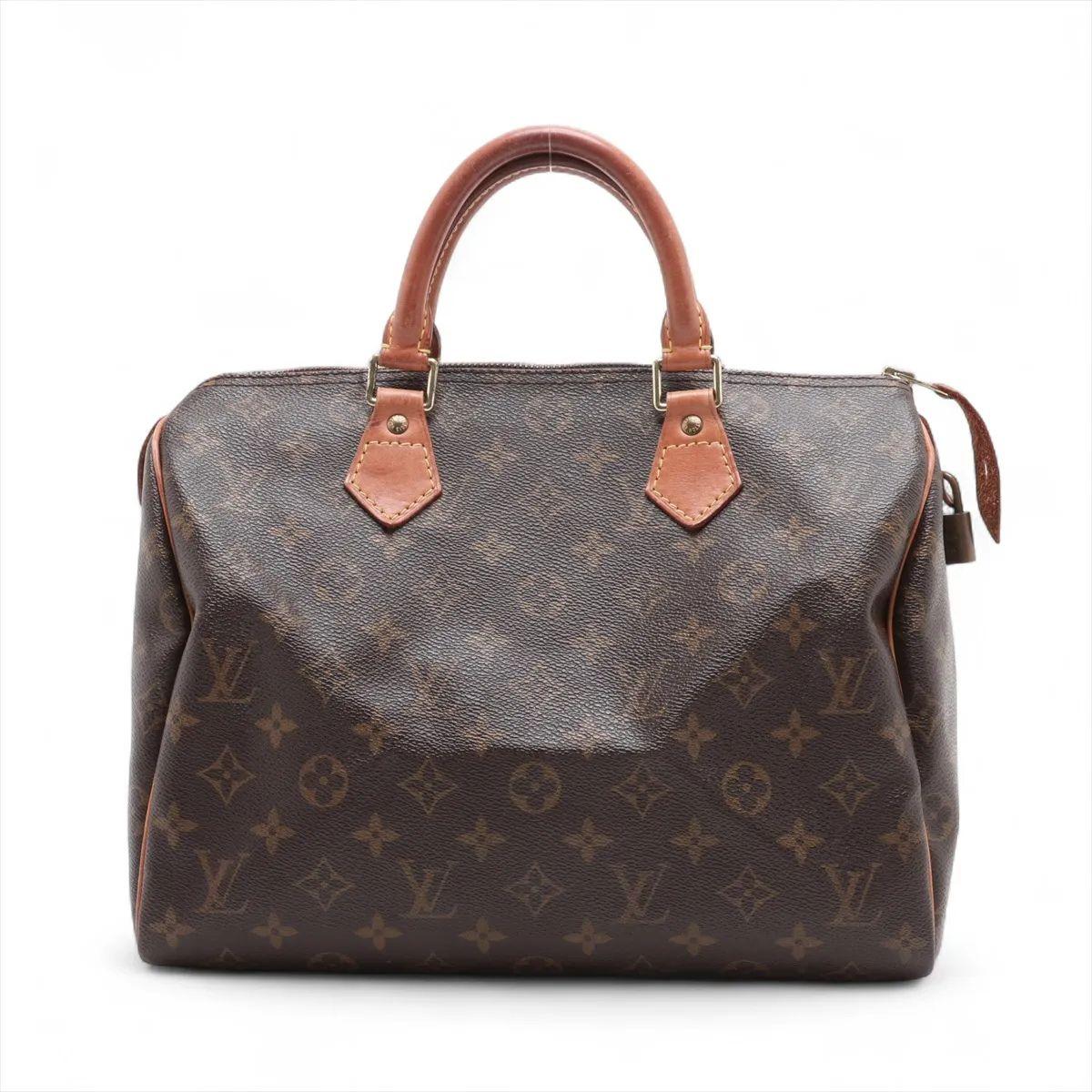 La Louis Vuitton Monogram Speedy 30 è una borsa classica e sofisticata, realizzata con l'iconica tela monogram. Caratterizzato da manici in pelle arrotolati, questo pezzo senza tempo offre una silhouette strutturata ma elegante. Il suo interno