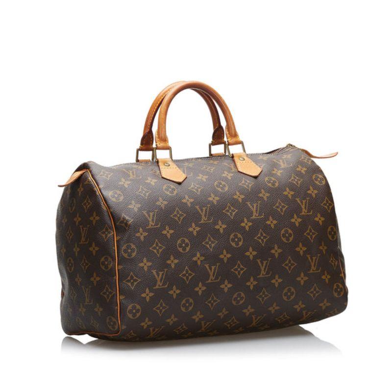Louis Vuitton Monogram Speedy 35 Boston Bag

The Speedy 35 features a monogram canvas body, rolled leather handles, a top zip closure, and an interior slip pocket.

Additional information:
Measurements: 33 W x 17 D x 23 H cm
Condition: Good
Before