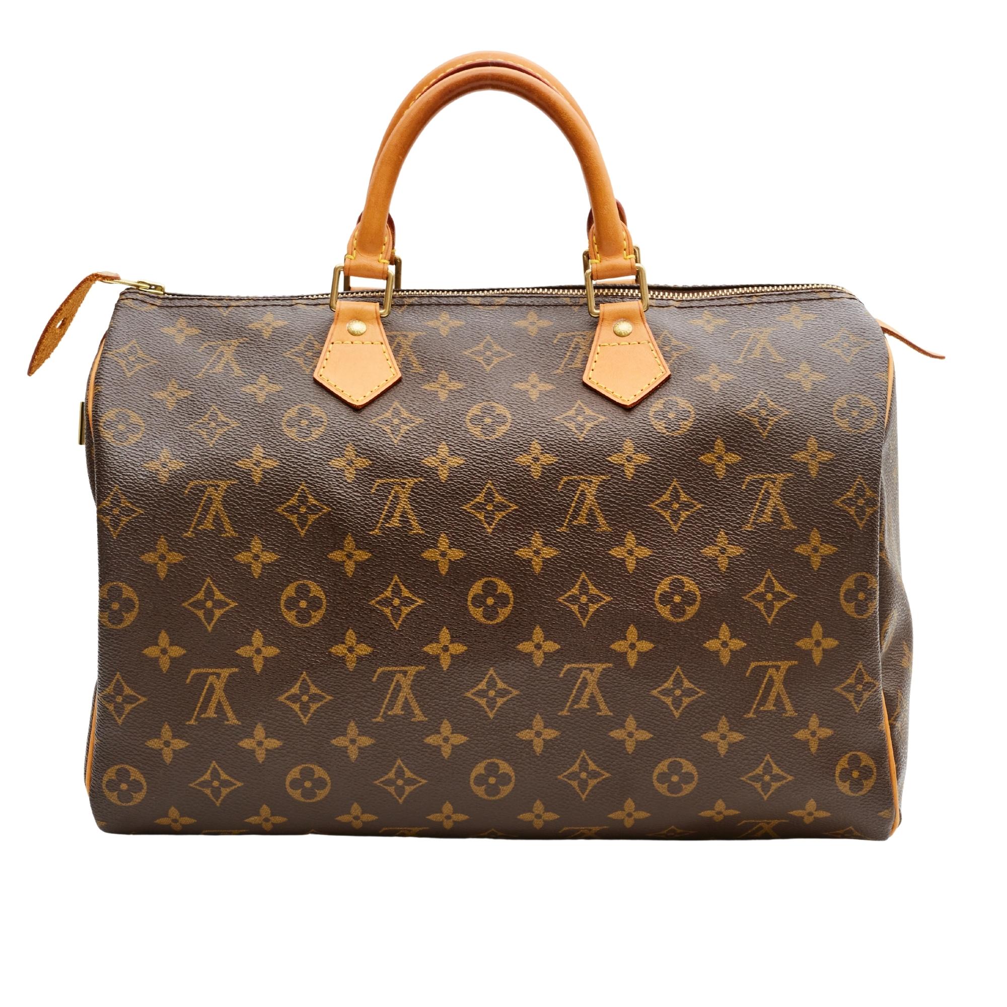 This iconic bag is made from brown monogram coated canvas with vachetta leather finishes. The Speedy 35 is a stylish handbag for both travel and daily use. Launched in 1930 as the 