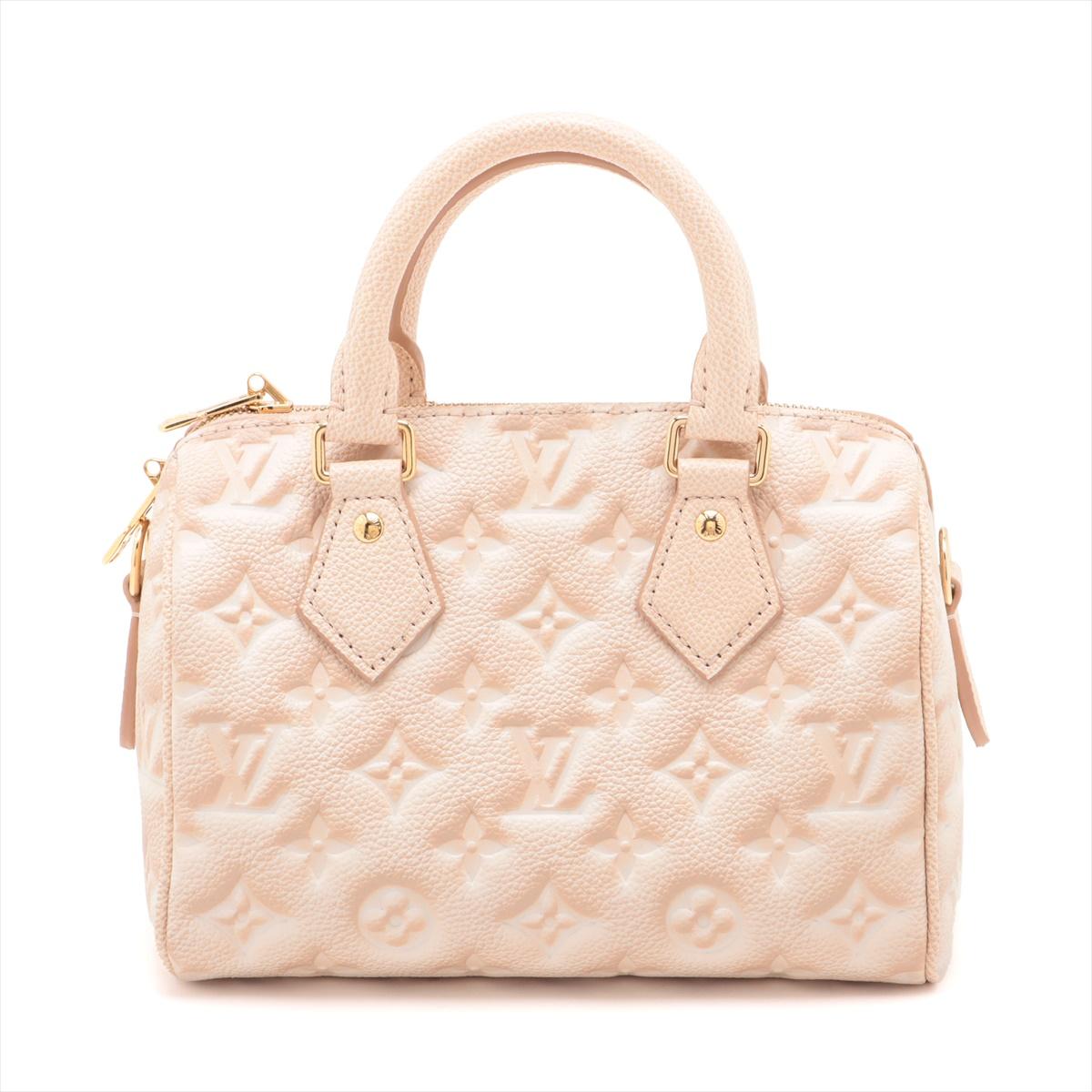 Retail: $2,840 second hand prices have gone UP since the color was discontinued

The Louis Vuitton Monogram Empreinte Speedy Bandoulière 20 in Pink Opale is a stylish top-handle bag that merges classic elegance with a modern twist. Made from