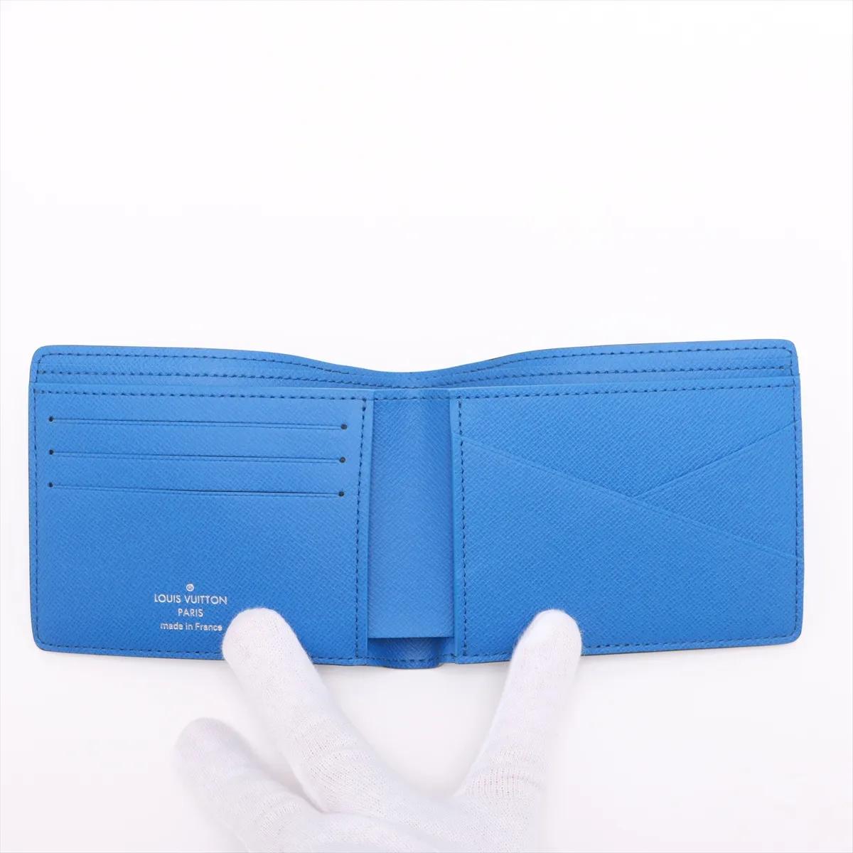 Donna Louis Vuitton Monogram Taigarama Portefeuille Multiple Blue Lagoon in vendita