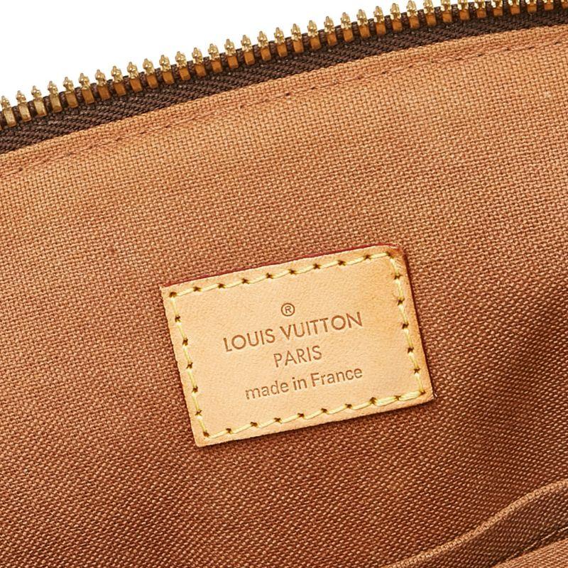 Louis Vuitton Monogram Tivoli GM Shoulder Bag

The Tivoli GM features a monogram canvas body, rolled vachetta leather handles, a top zip closure, and interior slip pockets.

Additional information:
Measurements: 33 W x 15 D x 29.50 H cm 
Condition: