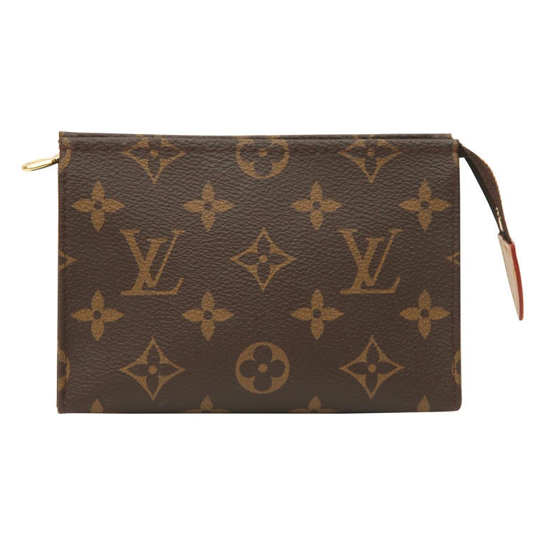 Louis Vuitton Brown Monogram Canvas Orsay Wrist Clutch Bag with brass  hardware For Sale at 1stDibs