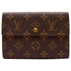 Louis Vuitton - Portefeuille à trois volets monogramme 