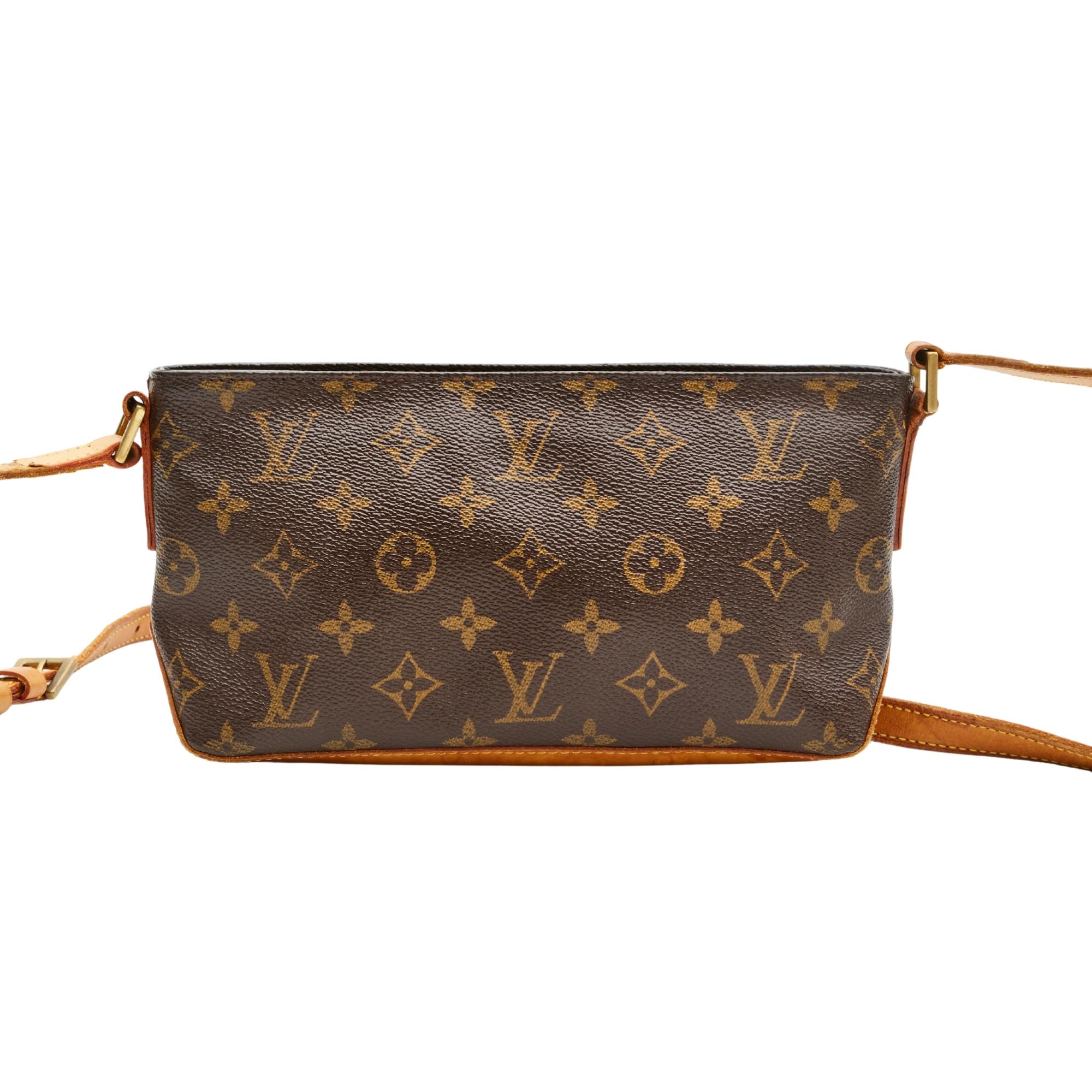 This shoulder bag is made with brown coated canvas with Louis Vuitton signature monogram print. The bag features beautifully aged light caramel natural cowhide leather finishes, top zip closure and a brown woven fabric interior.

COLOR: