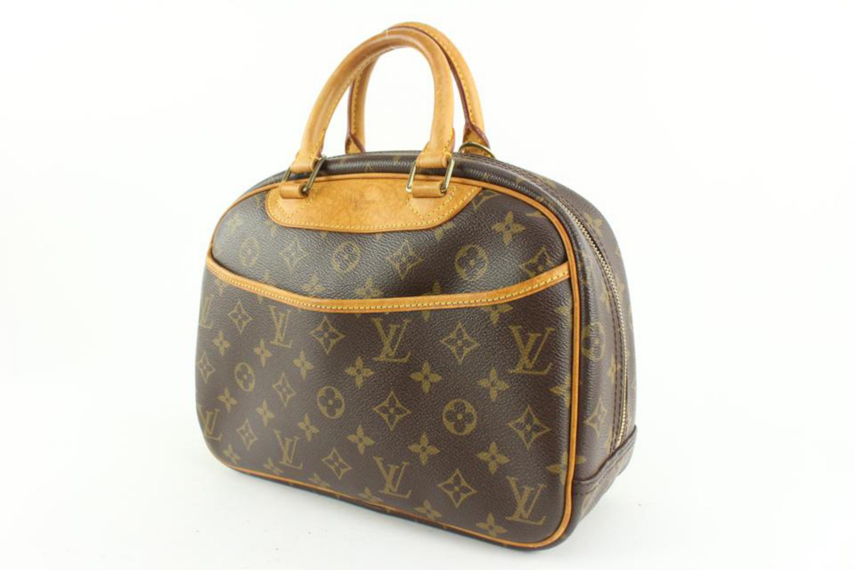 Louis Vuitton Monogram Trouville Bowler Bag 1224lv41
Date Code/Serial Number: MI1004
Made In: France
Measurements: Length:  11