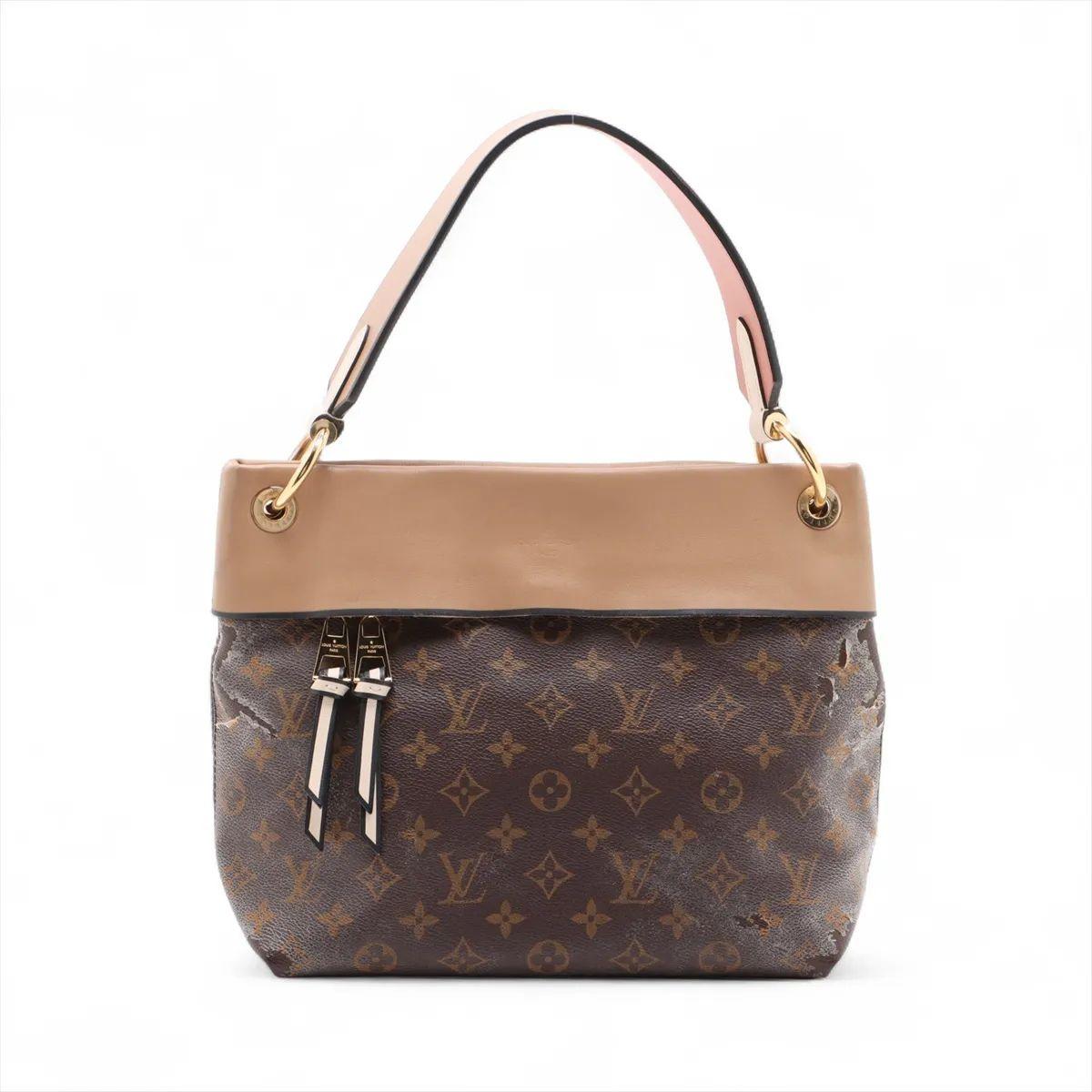 The Louis Vuitton Monogram Tuileries Hobo Bag in brown is a sophisticated yet modern design that reinterprets the house’s iconic Monogram canvas with contemporary accents. Crafted from signature Monogram canvas and complemented by smooth tricolor