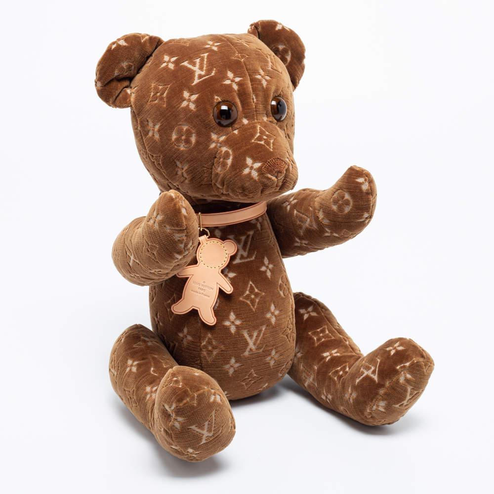 Louis Vuitton's Doudou teddy bear, originally designed by Marc Jacobs, continues to be a collectible or a gift for kids and LV collectors alike. This limited edition piece here is made of monogram velour fabric and added with a leather collar that