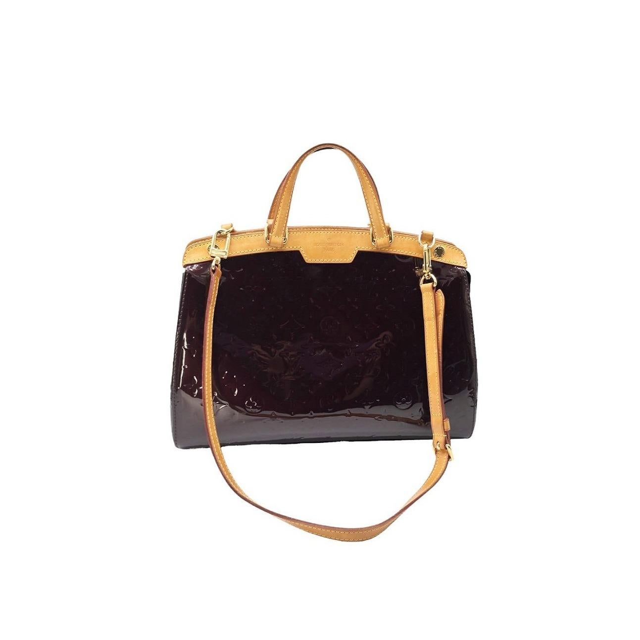 Expertly crafted in France, the Louis Vuitton Monogram Vernis Brea MM boasts a eggplant colored patent leather exterior with gold-tone hardware. Its spacious interior, featuring 2 slip pockets and a zipper pocket, is perfect for all your essentials.