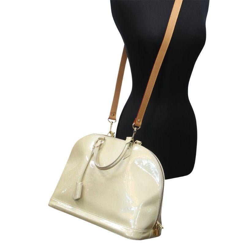Louis Vuitton Monogram Vernis Leather Alma Hand Bag with MISLUX Shoulder Strap

A classic from the house of Louis Vuitton, the shape of the Alma stands out. Louis Vuitton Alma was named after the Alma Bridge that connects Paris's fashionable