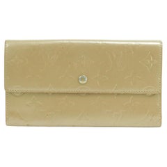 Portefeuille long portefeuille tresor Sarah Monogram Vernis Mat doré Louis Vuitton 3LK0110