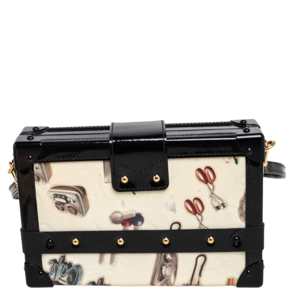 If you're looking for a bag with a blend of modern style and exquisite craftsmanship, this Louis Vuitton Petite Malle Bag is the answer. Crafted from Monogram Vernis leather, it features a stickers print, armored corners, a band flap with a