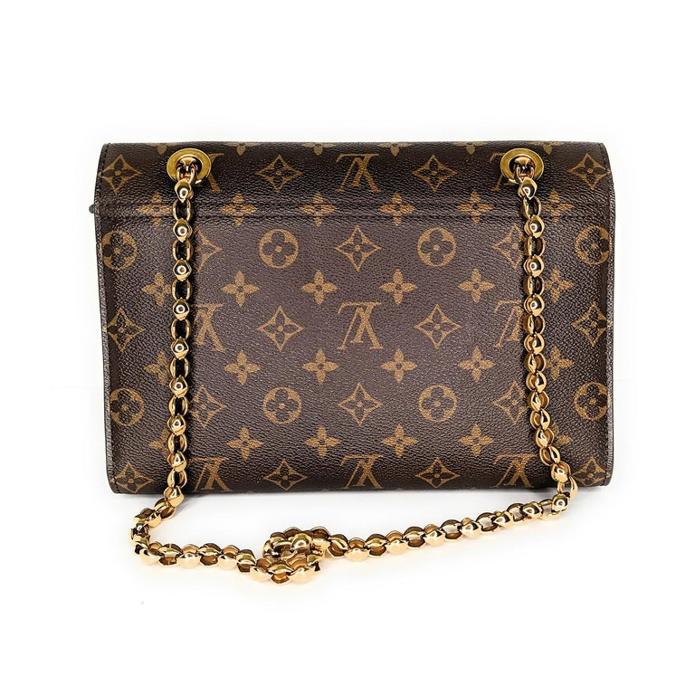 Louis Vuitton Monogram Victoire Shoulder Chain Bag In Excellent Condition For Sale In Scottsdale, AZ