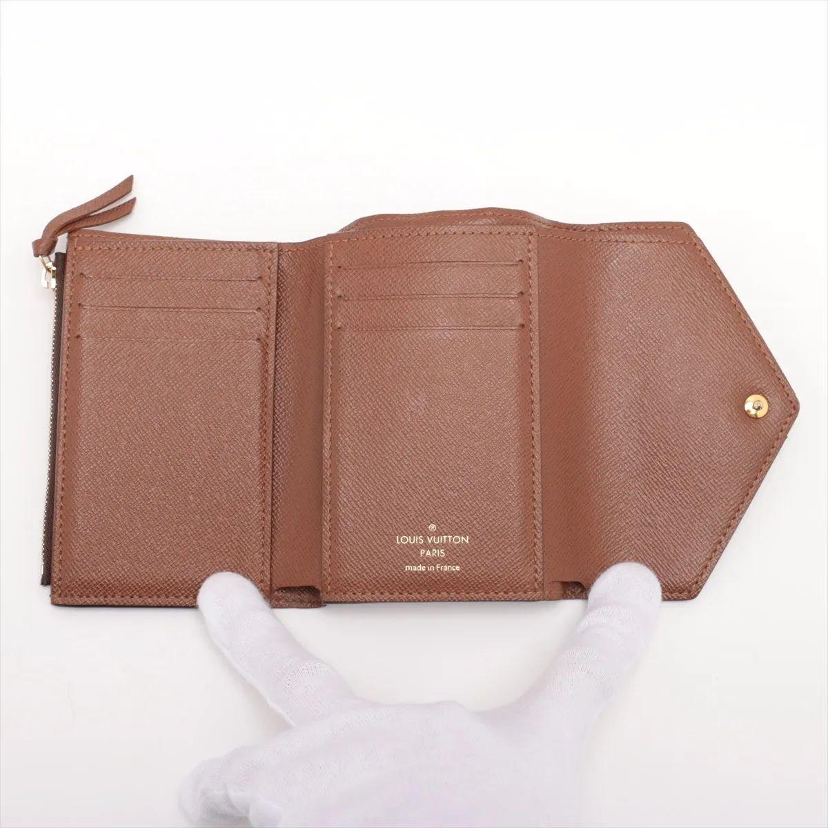 Portefeuille Monogram Victorine de Louis Vuitton Pour femmes en vente