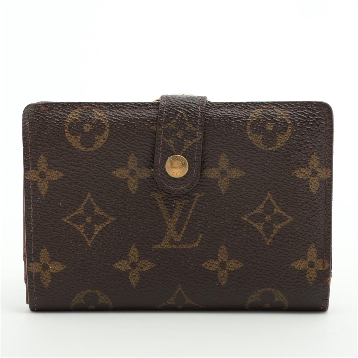The Louis Vuitton Monogram Viennois Wallet in Brown is a luxurious and timeless accessory that epitomizes the brand's heritage and craftsmanship. Crafted from Louis Vuitton's iconic Monogram canvas, the wallet exudes sophistication and elegance. The