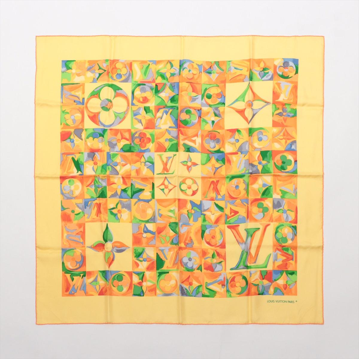 The Louis Vuitton Monogram Watercolor Silk Scarf in Multicolor Yellow is a vibrant and elegant accessory that adds a pop of color to any ensemble. Crafted from luxurious silk, the scarf features Louis Vuitton's iconic Monogram pattern reimagined in