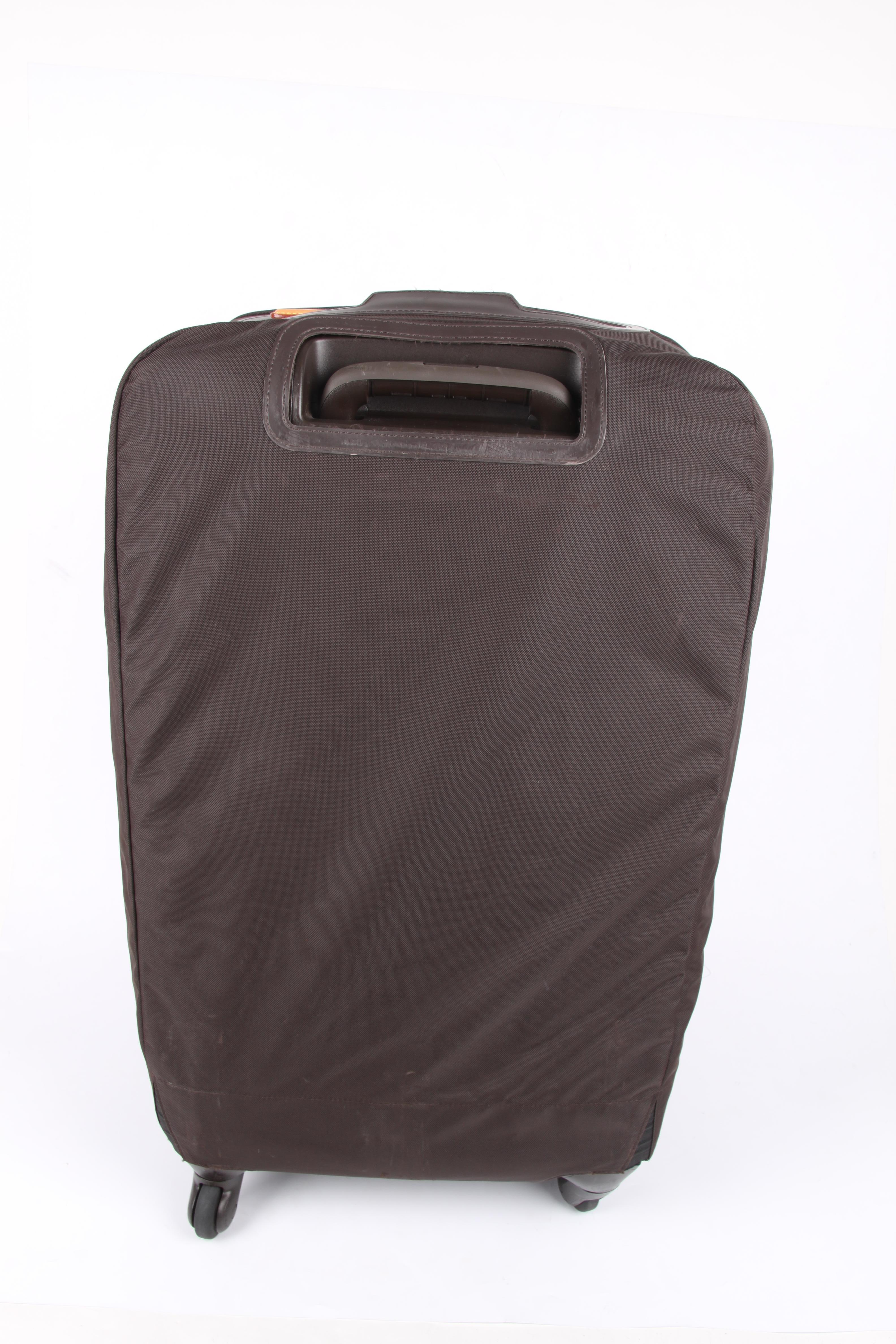 brown luggage bag