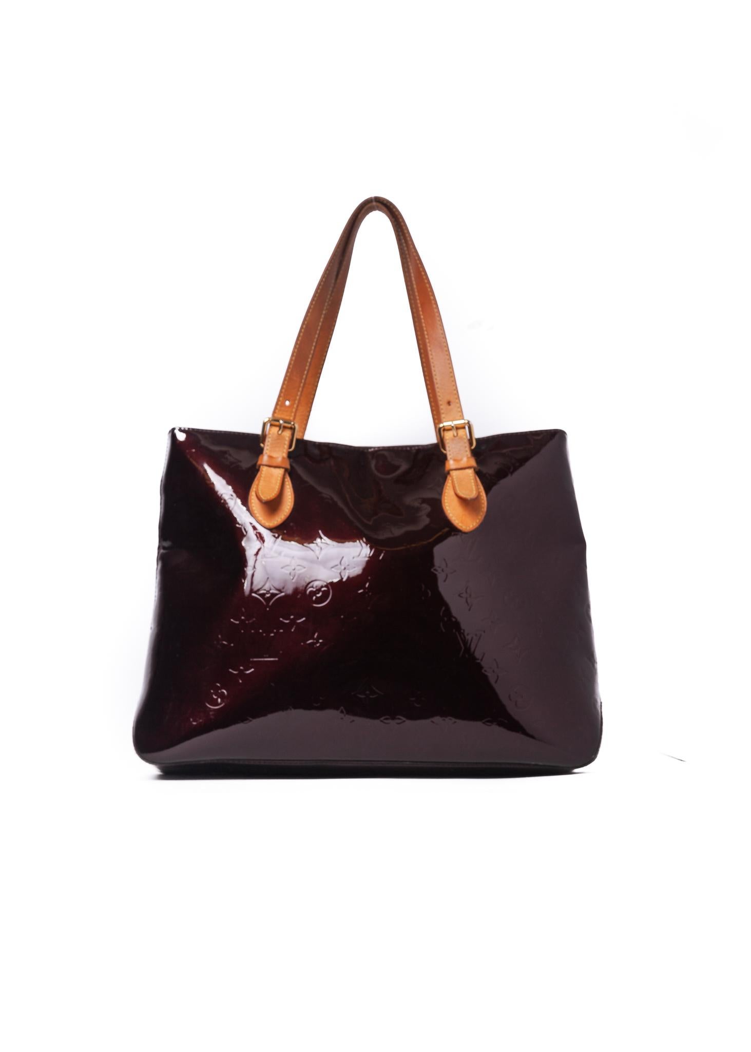 This style of patent leather monogram embossed bags are named Vernis as the French word for varnish is “vernis”.  Vernis was introduced by Marc Jacobs in 1998. 
This bag is made of calfskin leather embossed with monogram print and coated with a