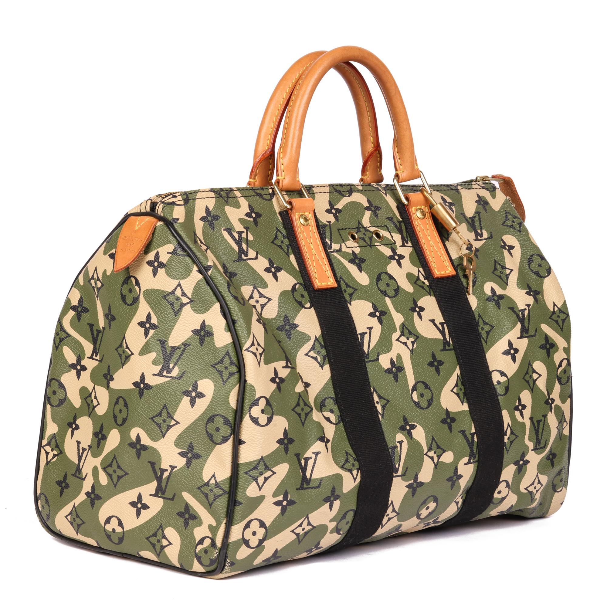 LOUIS VUITTON
Green Monogramouflage Coated Canvas & Vachetta Leather Murakami Speedy 35

Serial Number: AA2028
Age (Circa): 2008
Accompanied By: Louis Vuitton Dust Bag
Authenticity Details: Date Stamp (Made in France)
Gender: Ladies
Type: