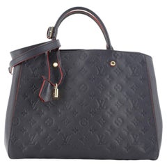 Montaigne Handtasche mit Monogramm aus Empreinte-Leder GM