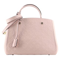 Louis Vuitton Montaigne Handtasche mit Monogramm aus Empreinte Leder MM