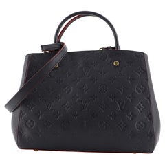 Louis Vuitton Montaigne Handtasche mit Monogramm aus Empreinte Leder MM